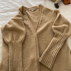 Long duster cardigan with pockets.